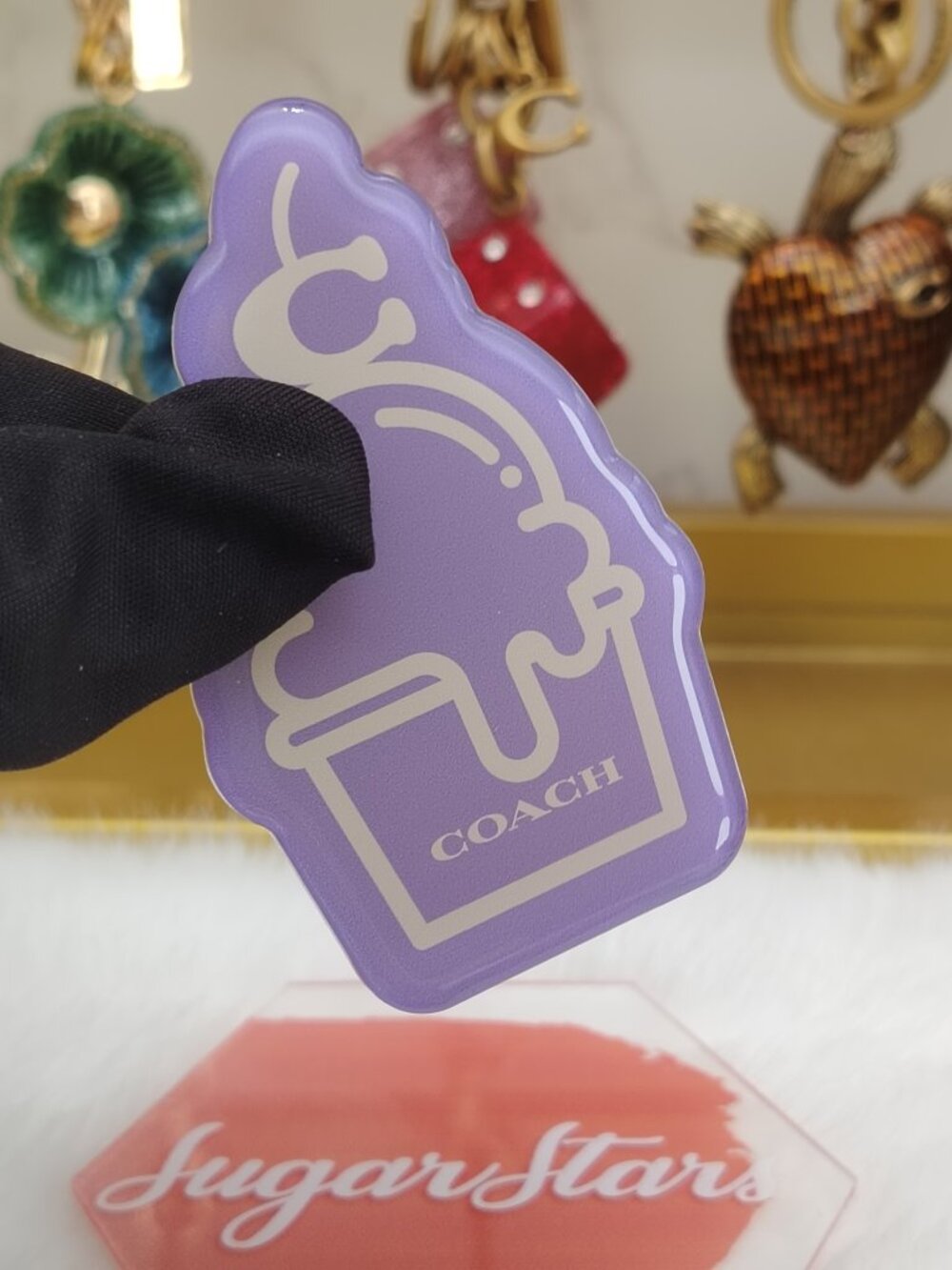 Coach phone grip phone holder